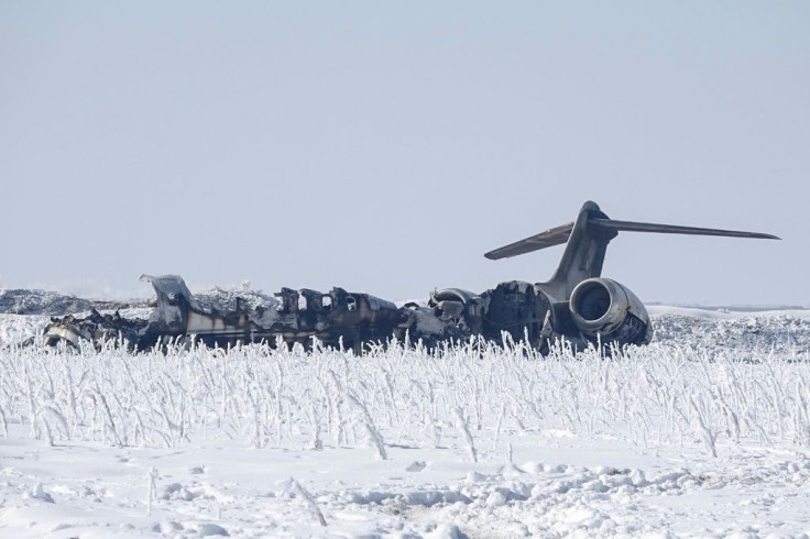 The wreckage of a US Bombardier E-11A jet after it went down in Taliban-controlled  territory in eastern Afghanistan