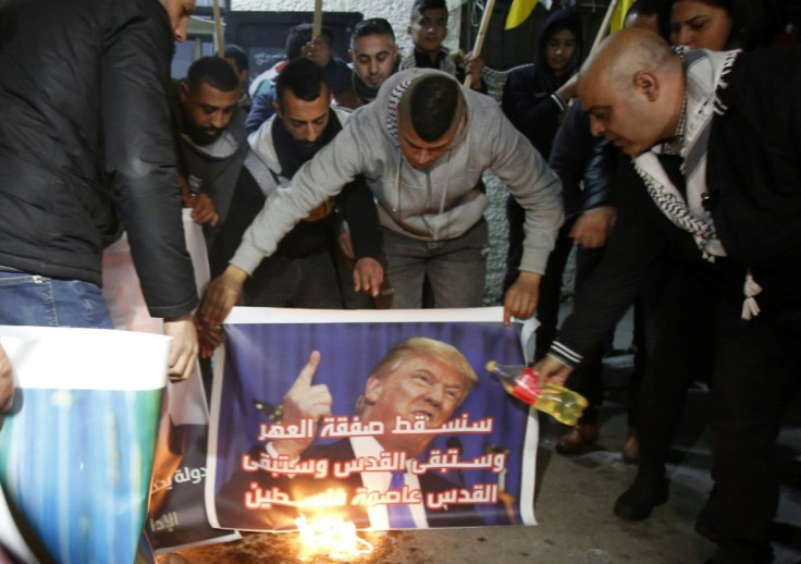 Palestinians oppose US President Donald Trump's Middle East peace plan, at a gathering in the Deheisheh refugee camp near the West Bank city of Bethlehem