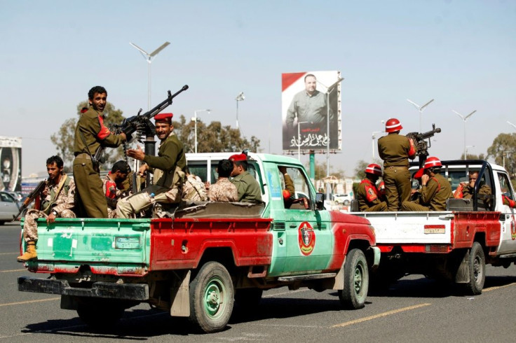 Members of the Yemeni Iran-backed Huthi rebels military police parade in the streets of the capital Sanaa on January 8, 2020