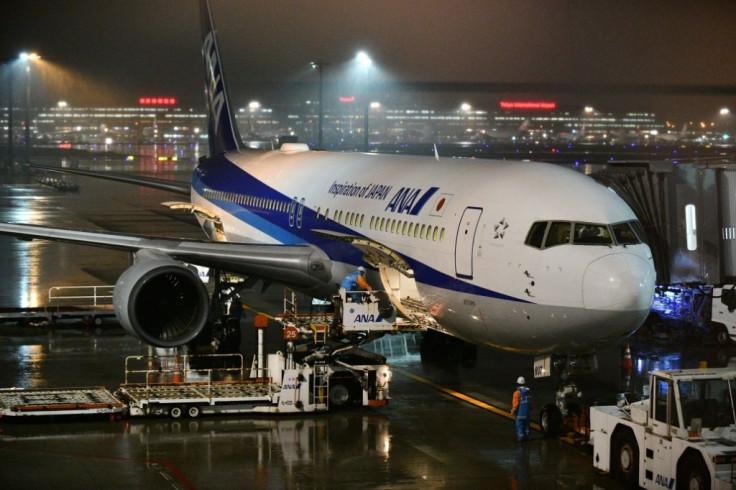 An ANA plane chartered by the Japanese government has gone to Wuhan to evacuate Japanese nationals from the epicentre of the China coronavirus outbreak -- here, the plane is seen before leaving Tokyo