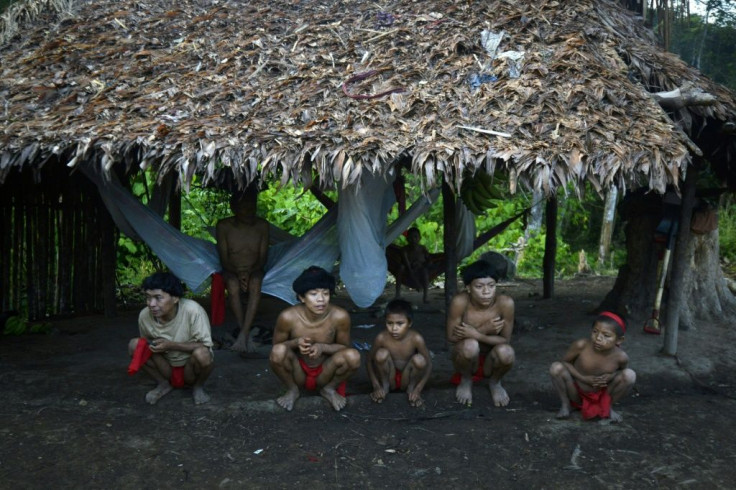 Yanomami natives in a hut  in Amazonas state in southern Venezuela, 19 km from the border with Brazil, in September 2012