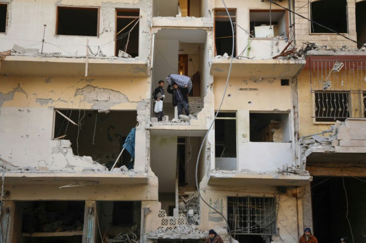 Many residents gathered what was left of their belongings and prepared to flee to relative safety closer to the Turkish border