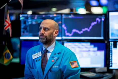 Traders at the New York Stock Exchange (NYSE) on January 29, 2020; Government data show slowing economic growth in the US