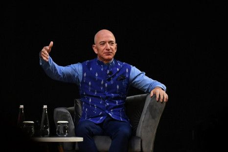 CEO of Amazon Jeff Bezos gestures as he addresses the Amazon's annual Smbhav event in New Delhi on January 15