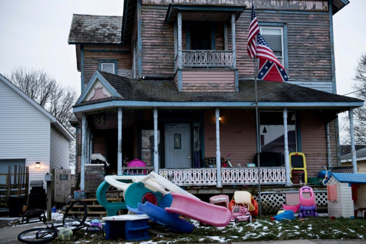 A house is seen flying both American and Confederate flags in North Baltimore, Ohio, which was part of the Union in the Civil War