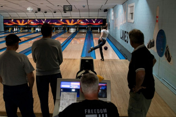 People play during bowling league games at Sheffield Lanes in Aliquippa, Pennsylvania