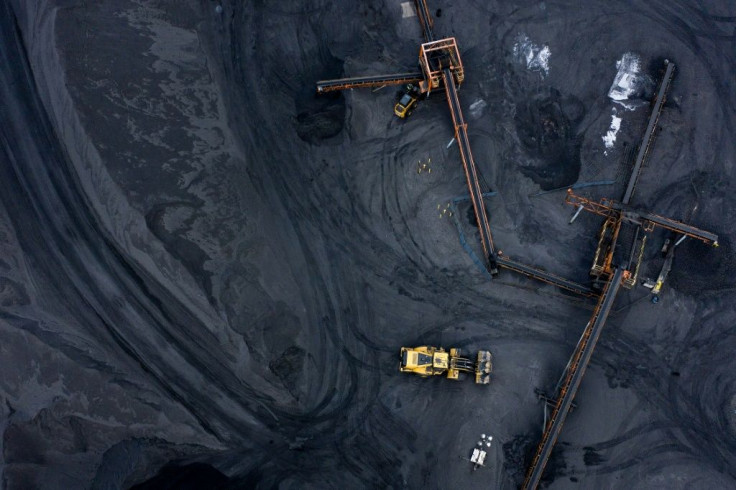 Heavy machinery work is viewed in the coke storage area at the US Steel plant in Clairton, Pennsylvania