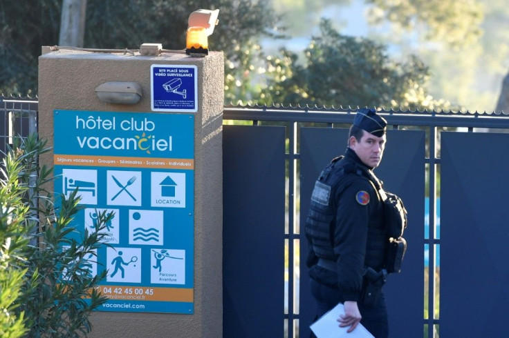 A French gendarme walks at the entrance of a holiday resort near Marseille, France, where French citizens evacuated from Wuhan, China, are expected to be put under quarantine for 14 days