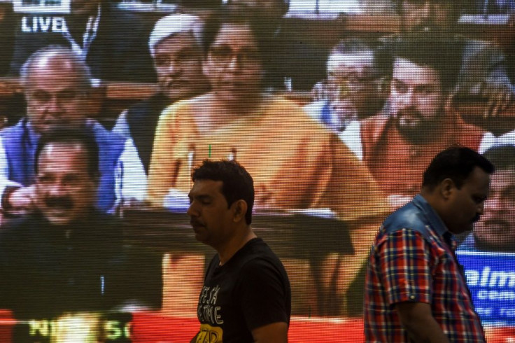 Finance Minister Nirmala Sitharaman said Indians earning under 1.5 million rupees ($21,000) a year could pay lower taxes if they agreed to forego existing exemptions