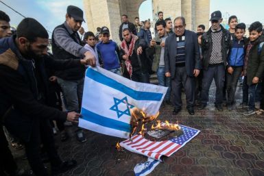 Palestinians demonstrated against the US plan in the West Bank and Gaza, with protesters burning Israeli and US flags on Saturday in the town of Rafah, in the Gaza Strip