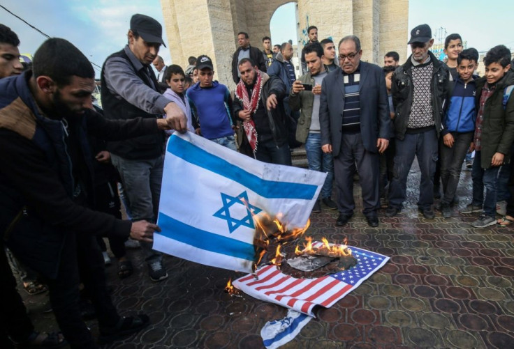 Palestinians demonstrated against the US plan in the West Bank and Gaza, with protesters burning Israeli and US flags on Saturday in the town of Rafah, in the Gaza Strip