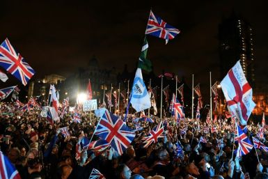 Brexit supporters wave Union flags as they gathered in Parliament Square on January 31, 2020, the day that the UK formally left the European Union