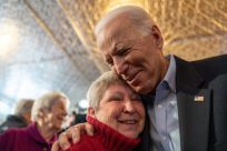Former vice president Joe Biden, hugging a voter in Burlington, Iowa, on January 31