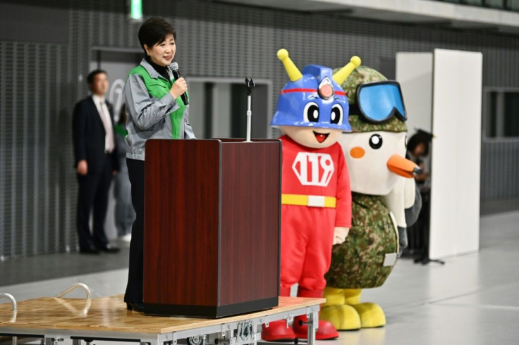 Tokyo governor Yuriko Koike urged people to wash their hands and wear surgical masks to help protect them from disease