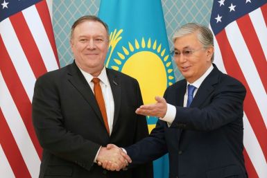 US Secretary of State Mike Pompeo shakes hands with Kazakh President Kassym-Jomart Tokayev