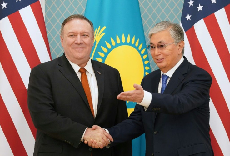 US Secretary of State Mike Pompeo shakes hands with Kazakh President Kassym-Jomart Tokayev