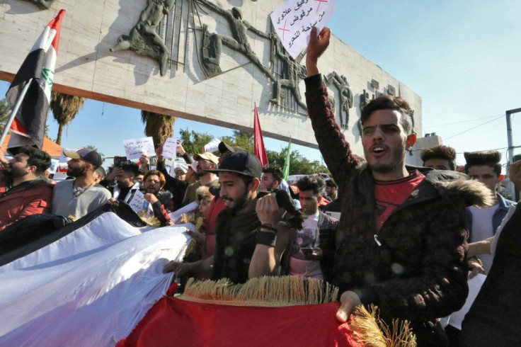 In Baghdad, hundreds of students flooded the streets around the main protest camp of Tahrir Square, demonstrating against Allawi's appointment