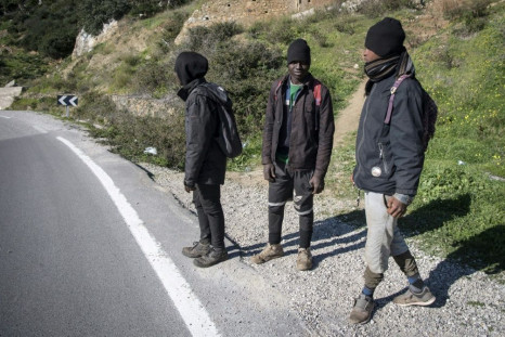 African migrants Mustapha (C) and his travel companions Ahmed and Omar are hoping to enter the Spanish enclave of Ceuta from Morocco but a clampdown is making the crossing difficult
