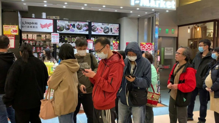 Long queues form at pharmacies in Hong Kong as fears spread through the crowded metropolis over China's new coronavirus epidemic.