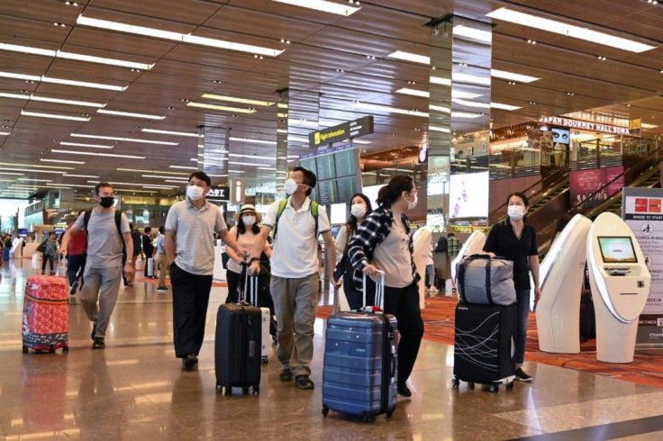 A major conference scheduled on the eve of the Singapore Airshow has been cancelled over the global health scare, but organisers said the main event, Asia's biggest airshow, will proceed