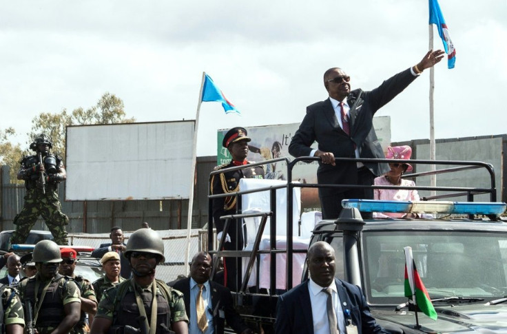 Malawi President Peter Mutharika  waving to supporters following last May's election, annulled Monday