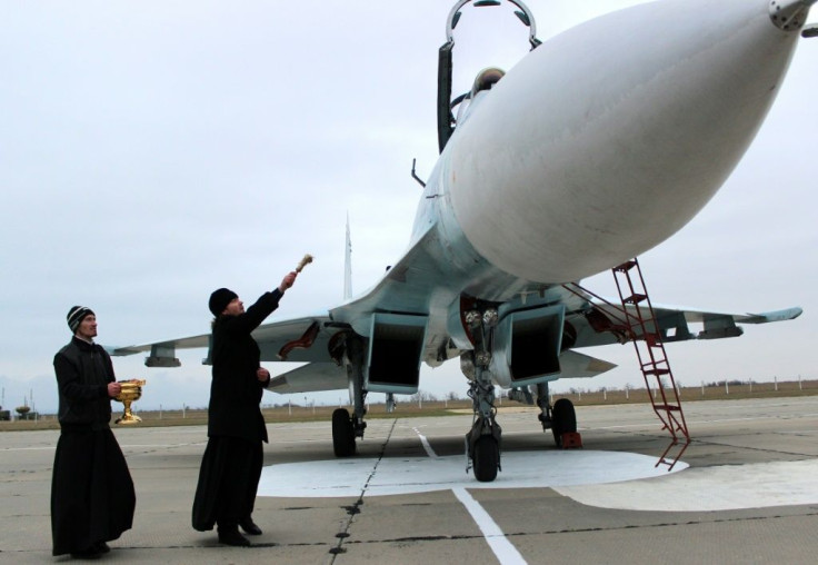 Blessing ships and aircraft such as this SU-27 SM fighter jet is believed to bestow divine protection