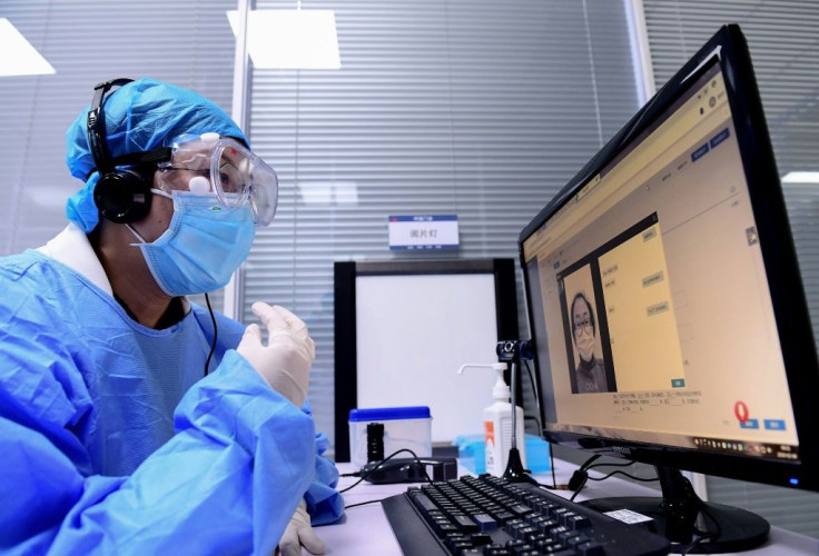 A doctor speaks with a patient during an online consultation session at a hospital in Shenyang in China's northeastern Liaoning province