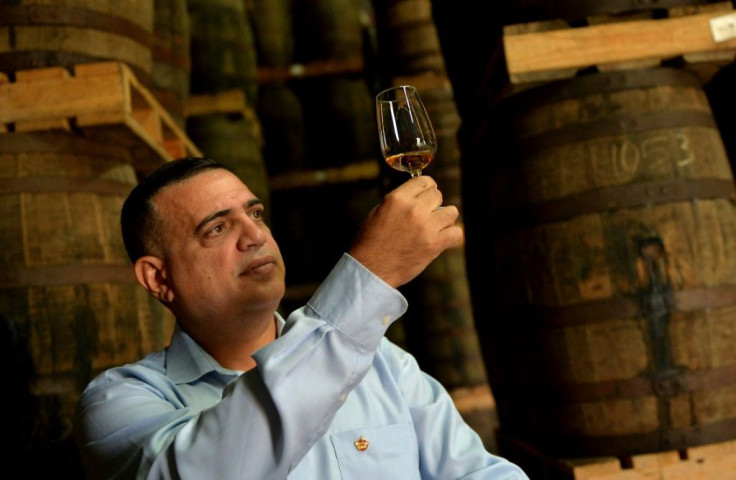 Cuban rum master Asbel Morales checks out the quality of the Havana Club produced at the San Jose de las Lajas distillery