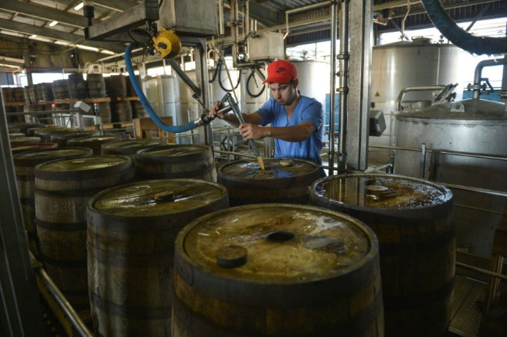 Once approved, the rum is stored for years in American white oak barrels previously used for whiskey where will remain until it has acquired it's dark color and fruity flavors