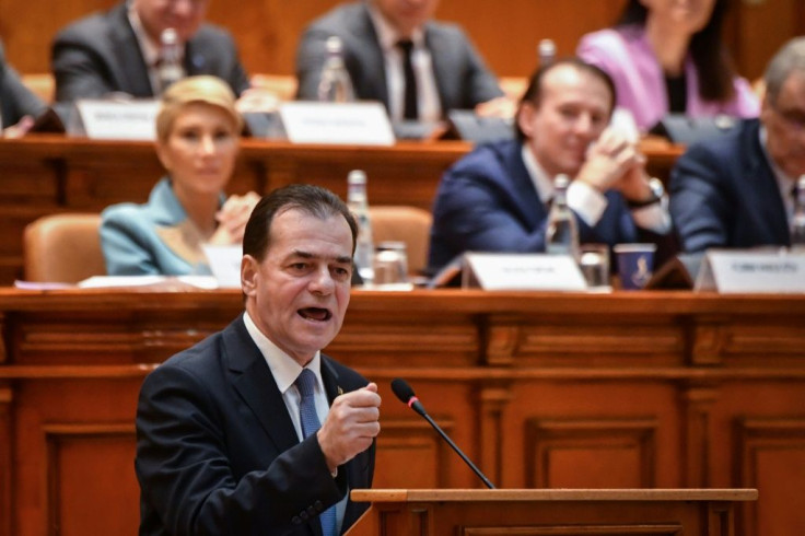 Ludovic Orban, seen speaking during the no-confidence vote, blamed "retrogressive forces" for his government falling -- though his liberals lead polls for an expected snap election