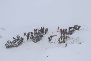 The bodies of more than two dozen rescue workers and civilians were discovered in Van province, where they had been helping dig out a minibus buried by a first avalanche late Tuesday