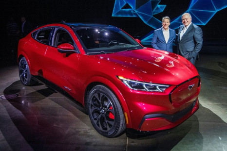 Ford CEO James Hackett (R), shown here at the November 2019 unveiling of the Mustang Mach-E, vowed that the all-electric vehicle will help turn around Ford's fortunes