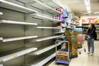 Photos of empty supermarket shelves prompted the government to condemn those spreading rumours that the city was running out of toilet paper