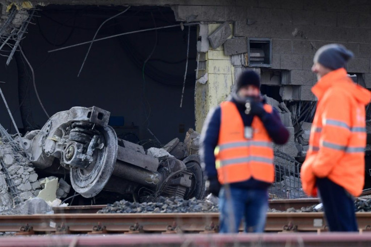 The engine reportedly went off the rails and struck a freight wagon on a parallel track before hitting the building