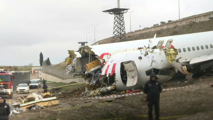 IMAGES of Scenes of a crashed airplane the day after it skidded off a runway at an Istanbul airport, caught fire and split into three after landing in rough weather, killing three and injuring 179.