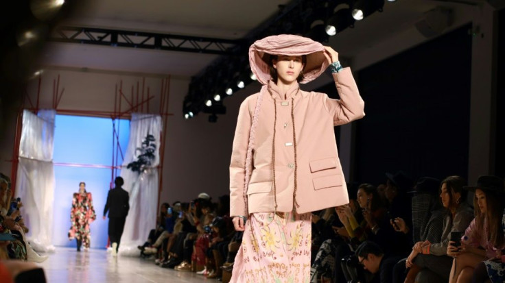 A model walks the runway for Mukzin x Harbin fashion show during New York Fashion Week