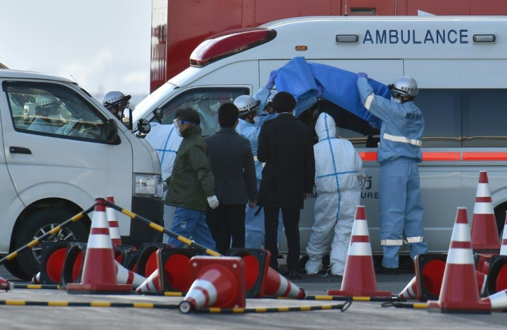 The new cases raise the number of confirmed infections on board the ship to at least 61