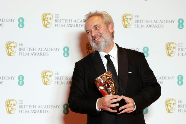British filmmaker Sam Mendes is leading the charge into Oscars night with his war epic "1917" -- he is seen here with his Bafta award for best director