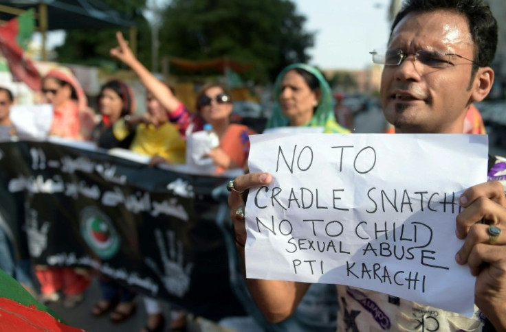 A majority of lawmarkers in Pakistan's parliament have passed a non-binding resolution calling for convicted child killers and rapists to be publically hanged