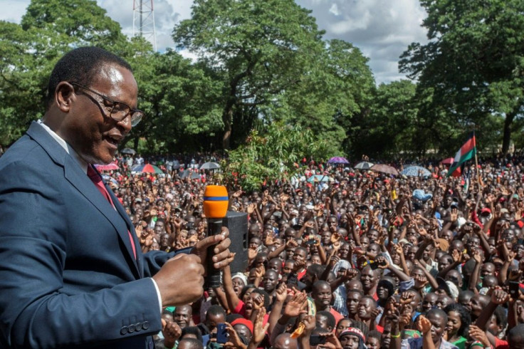 Opposition leader Lazarus Chakwera celebrates the court's decision to annul an election in which he lost to the president by 159,000 votes