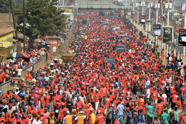 Opponents of Guinean President Alpha Conde's suspected plans to stay in office for a third term rally in the streets of the capital Conakry in January 2020