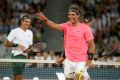 Putting on a show: Federer and Nadal were miked up as they enjoyed themselves playing an exhibition doubles with American billionaire Bill Gates and South African comedian Trevor Noah
