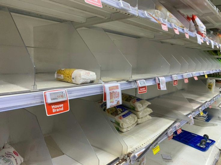 Singaporeans started stocking up after the city raised its coronavirus alert to orange, the second highest