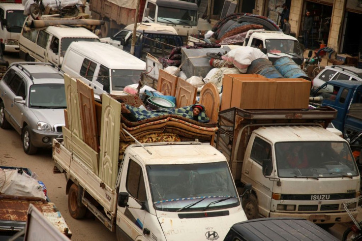 The fighting in Idlib province has sent hundreds of thousands of fleeing civilians onto the roads, seeking relative safety nearer the Turkish border