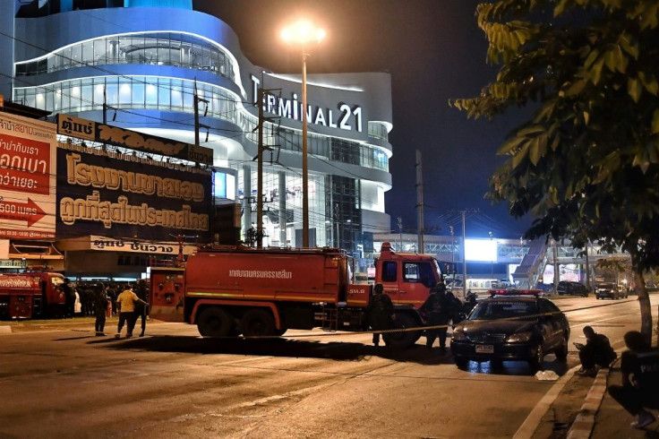 Police set up a cordon around the Terminal 21 shopping mall in Nakhon Ratchasima, Thailand, after a gunman inside opened deadly fire killing at least 20