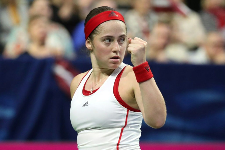 Jelena Ostapenko on the way to a three-set win over Sofia Kenin that kept Latvia alive in their Fed Cup qualifying tie against the United States in Everett, Washington