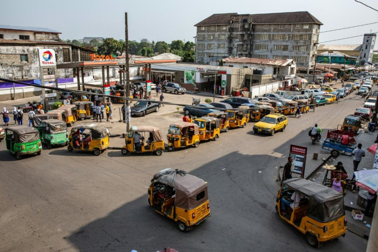 Cars and tuk-tuk taxis often need to wait for hours at fuel stations as Liberia experience petrol a shortage