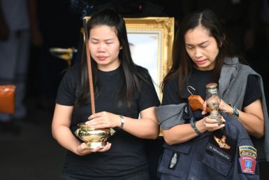 Families of the 29 victims of a rogue soldier in Thailand went  to a city morgue in Nakhon Ratchasima to carry home coffins bearing their dead