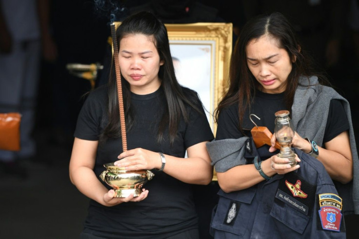 Families of the 29 victims of a rogue soldier in Thailand went to a city morgue in Nakhon Ratchasima to carry home coffins bearing their dead
