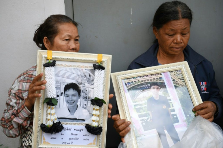 Holding portraits of their relatives and dabbing away tears, families of the victims of a mass shooting at the Terminal 21 shopping mall, arrived at a city morgue in Nakhon Ratchasima
